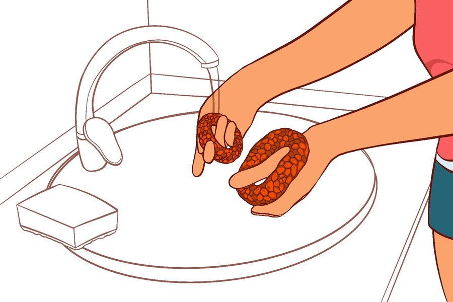 Washing the lattice cushions under a tap