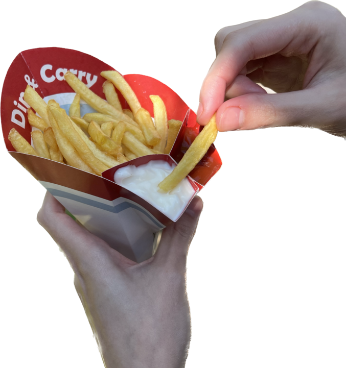 Hand holding the Dip & Carry package while dipping a fry into one of the integrated sauce compartments